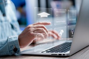 Concept of Online education. man use Online education training and e-learning webinar on internet for personal development and professional qualifications. Digital courses to develop new skills.